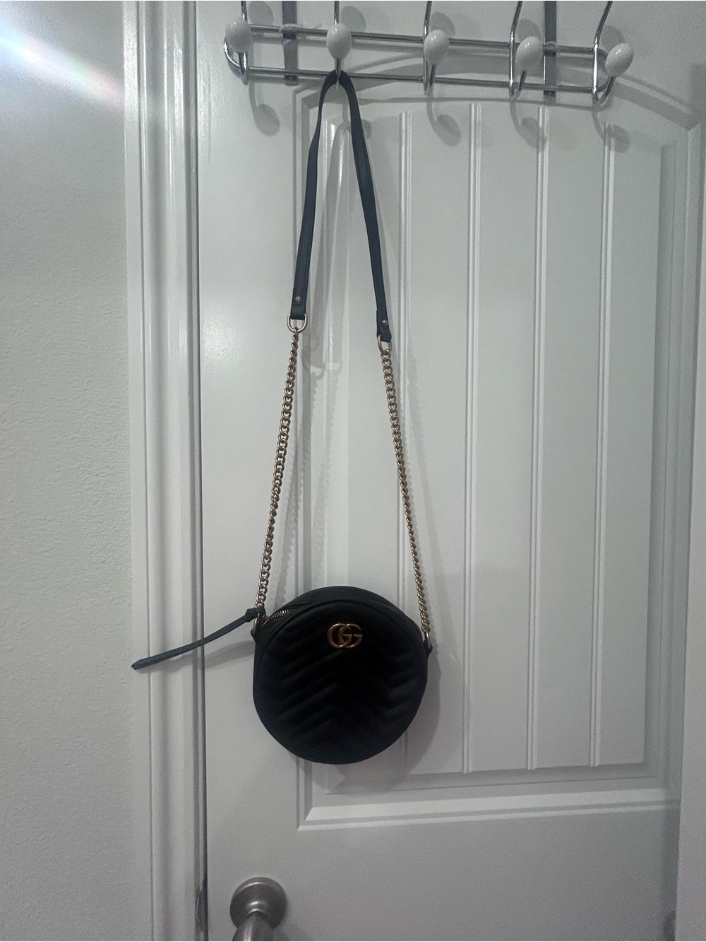 Gucci Black Quilted Round Crossbody with Gold Hardware